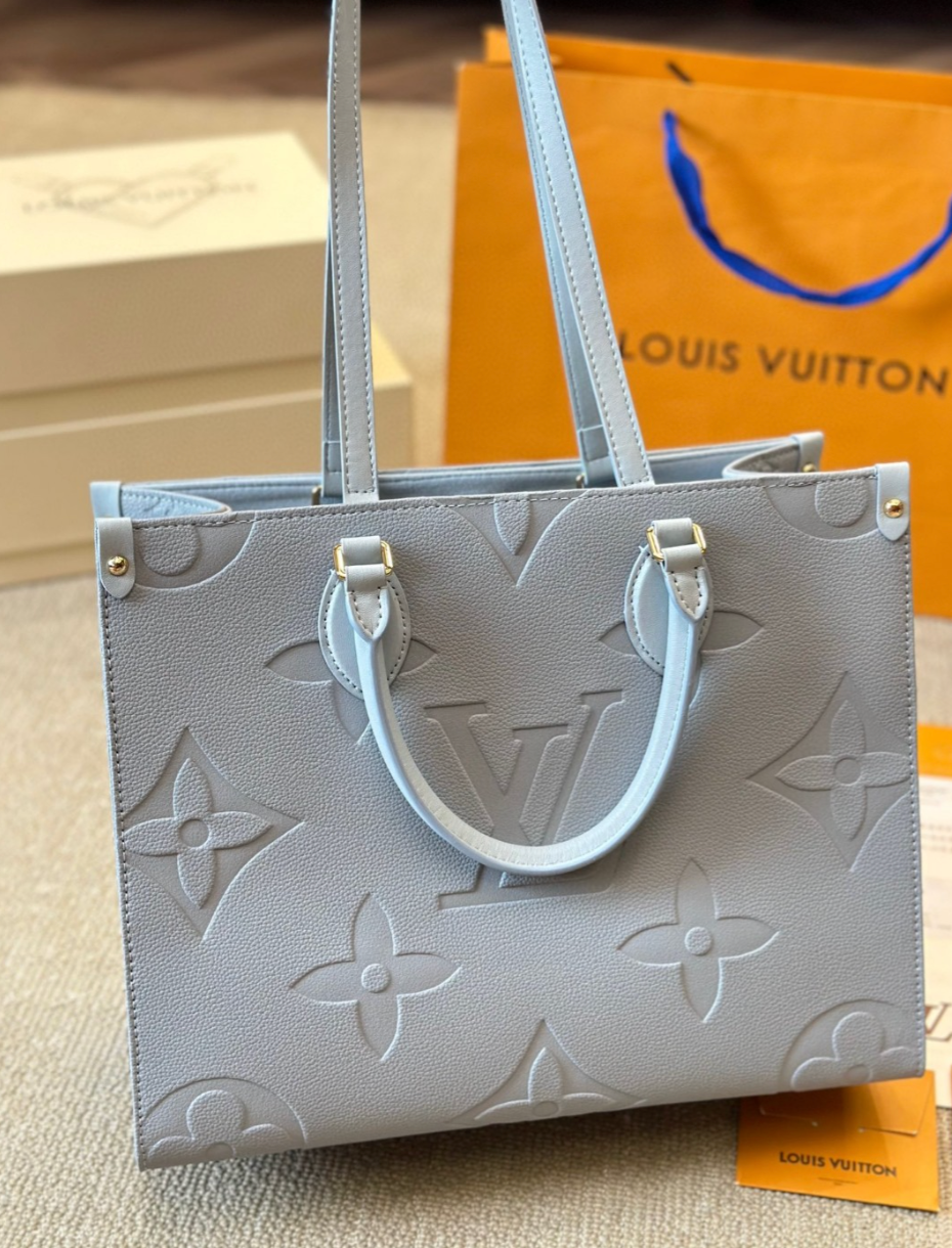 OnTheGo Tote Bag Blue Empreinte Leather LOU - Level 3