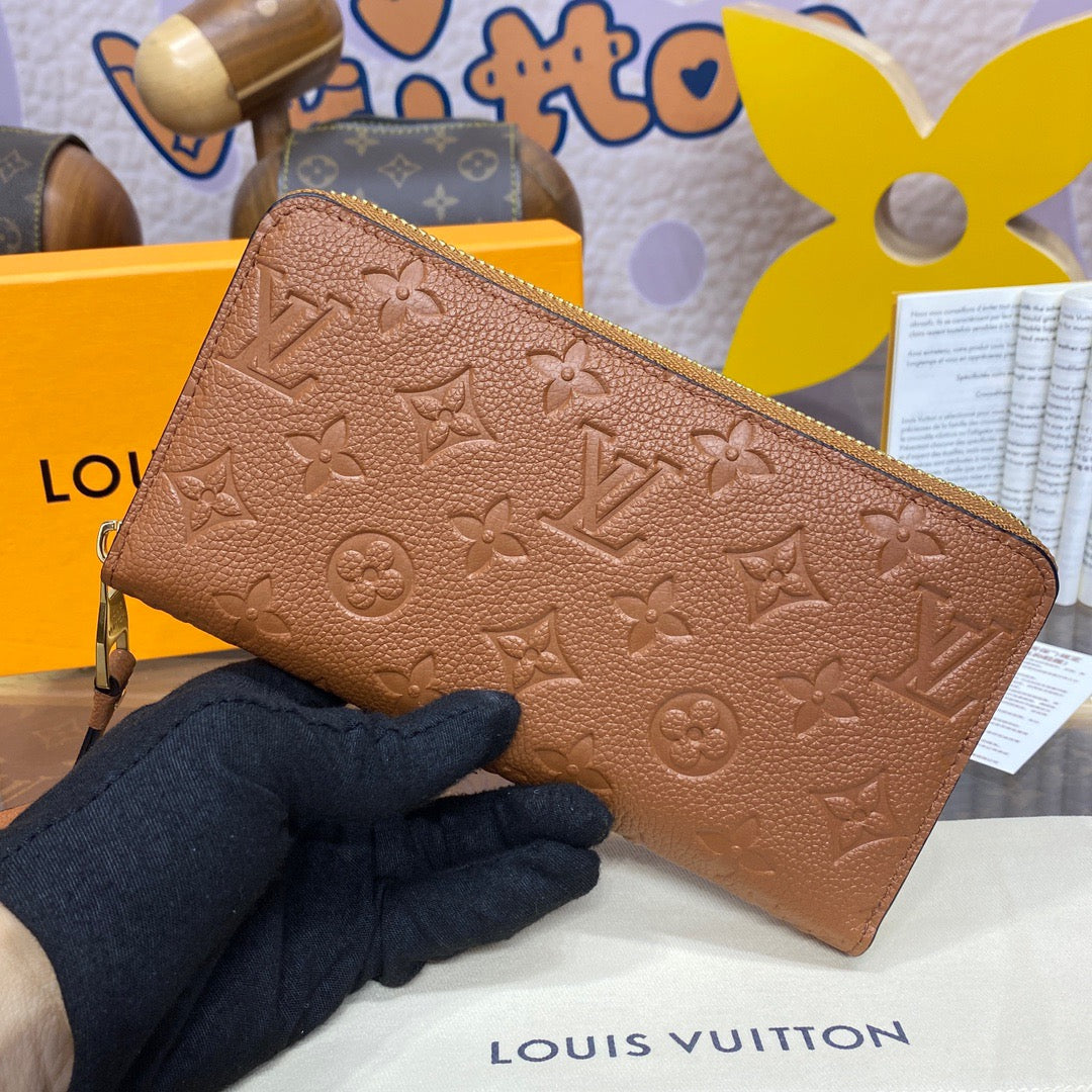 Brown Empreinte Leather Zippy Wallet LOU - Level 5